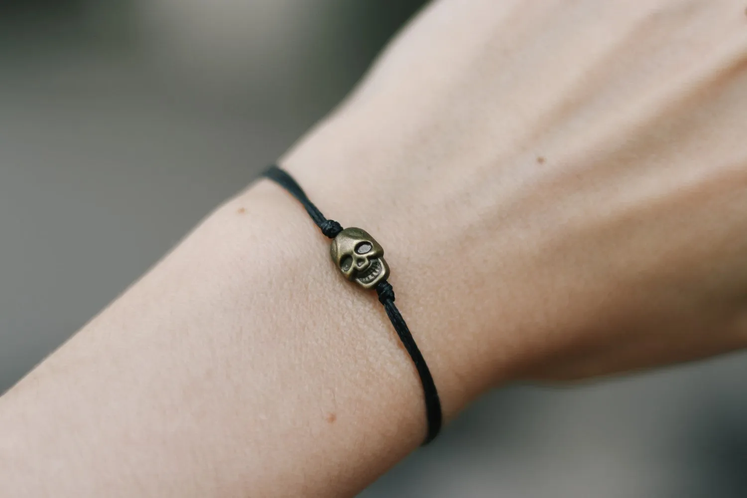 Bronze skull bead bracelet, black string, gift for her, adjustable bracelet