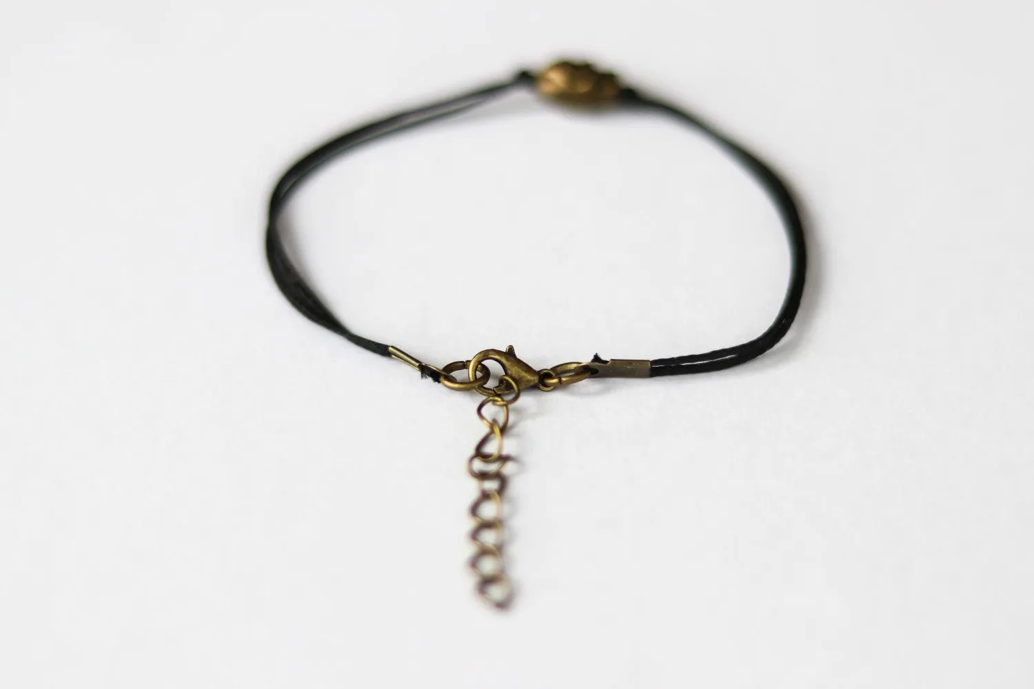 Bronze skull bead bracelet, black string, gift for her, adjustable bracelet